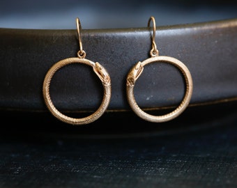 Gold Ouroboros Earrings. Snake circle earrings. Symbol of rebirth. 14K Gold Filled and Bronze Snakes. Unique snake earrings. Snake earrings.