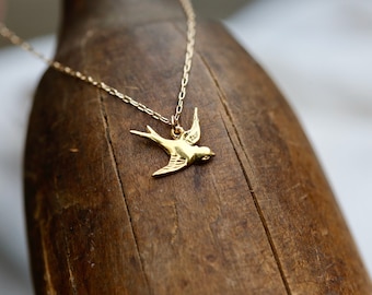 Golden Sparrow Necklace. Tiny Gold Sparrow Necklace in Gold Filled and Vermeil - Dainty Gold Bird Pendant Necklace. Gold swallow necklace.