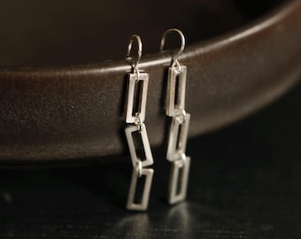 Shape Shifter Earrings. Handmade sterling silver modern chandelier earrings. Statement earrings. Kinetic Earrings. Long silver earrings.