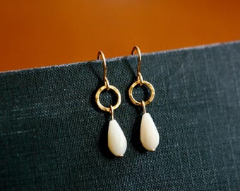 White Coral Chandelier Earrings. 14K gold filled hammered circle and genuine white coral gemstones. . 14K Gold Filled Ear Wires.