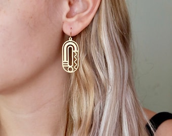 Unique gold earrings. Large geometric brass shapes with  14K gold filled ear wires. Modern earrings. Artsy earrings. Statement earrings.