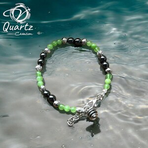 Bracelet made of natural green Jade and Hematite stones.