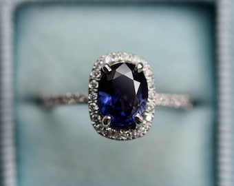 Indigo blue sapphire ring. Blue purple sapphire engagement ring. Oval diamond ring. Halo ring. White gold engagement ring by Eidelprecious