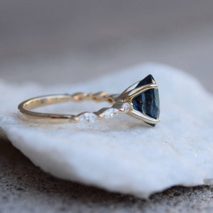 Peacock sapphire ring. Blue green sapphire engagement ring. Peacock blue sapphire oval diamond ring. Godivah ring. Yellow gold ring. image 4