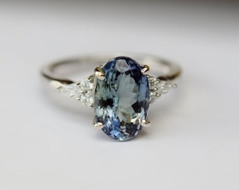 Teal tanzanite engagement ring. Peacock green tanzanite 3.4ct oval diamond ring 14k white gold. Campari Engagement ring by  Eidelprecious.