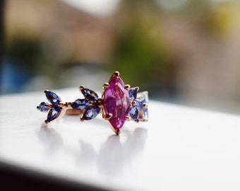 Marquise Pink sapphire and tanzanite engagement ring. Cluster multi stone engagement ring in rose gold .