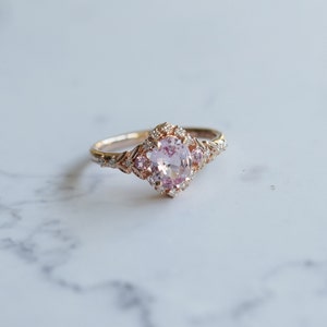 Kassandra pink sapphire engagement ring. Fantasy Vintage Rose gold engagement ring. Peach sapphire ring. Oval Sapphire ring by Eidelprecious