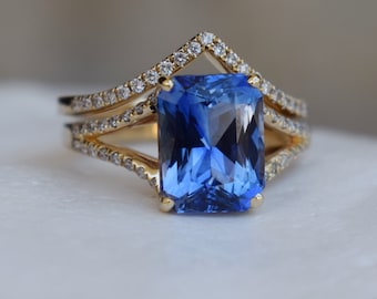 Ceylon blue sapphire engagement ring. Split engagement ring. Blue sapphire emerald radiant cut engagement ring