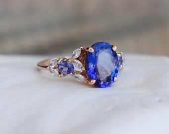 Bespoke Tanzanite engagement ring in 14k Rose Gold for 10 year anniversary. Cluster ring. Blue tanzanite Ring Eidelprecious. Ready to ship