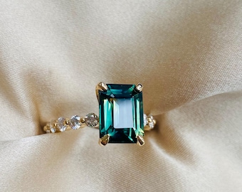 Emerald green sapphire ring. Godivah diamond ring. Gold Engagement Ring. Radiant cut sapphire ring. Blue sapphire ring. One of a kind ring