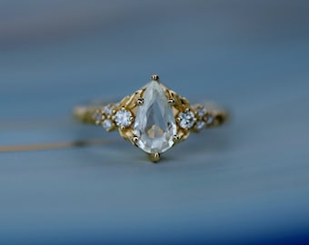 Stella white sapphire ring. Pear shaped engagement ring, sapphire and diamond ring ring in gold. Anniversary gift for wife.