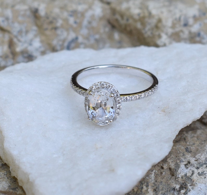 Oval white sapphire ring. 1.6ct White sapphire engagement ring. White gold sapphire engagement ring. Halo engagement ring by Eidelprecious image 2