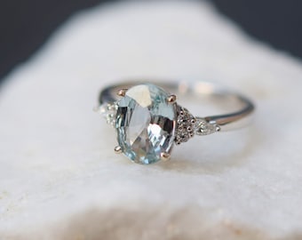Eidelprecious Mint Sapphire engagement ring. Blue green sapphire engagement ring. Light blue green sapphire oval ring Eidelprecious