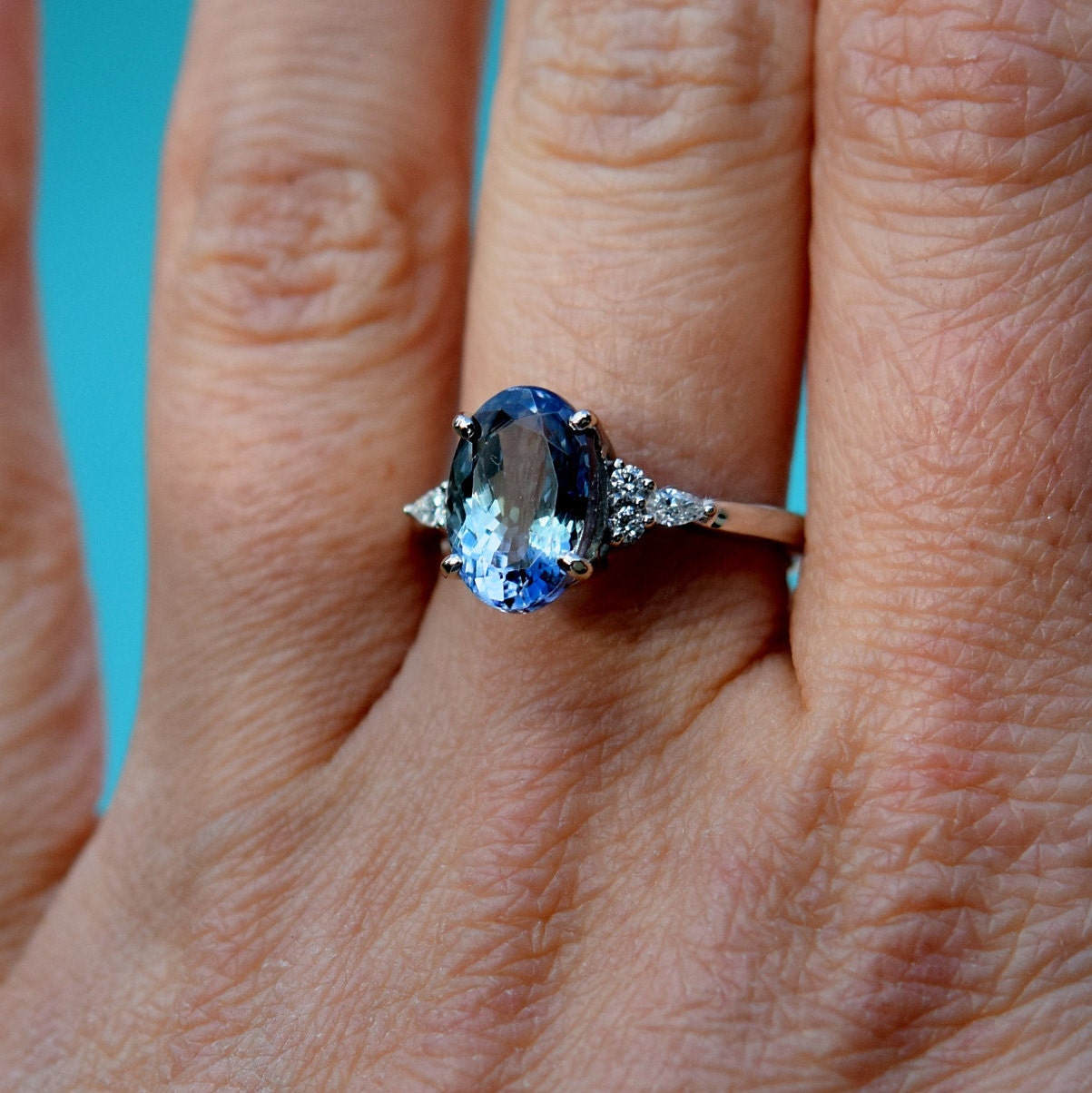 Teal tanzanite engagement ring. Peacock green tanzanite 3.4ct oval ...