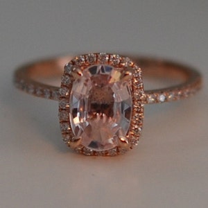 Rose gold ring engagement ring. Peach sapphire 1.69ct cushion sapphire diamond ring.