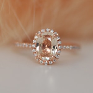 Rose gold ring. Peach sapphire diamond ring. 14k rose gold oval sapphire ring. Engagement ring Eidelprecious.