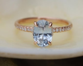 Oval Light Blue Sapphire Engagement Ring: Thin 14k Rose Gold Diamond Band