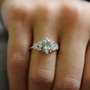 Greta Alexandrite ring white gold. Marquise cut natural Alexandrite and diamond ring in 14k white gold Eidelprecious. Enchanted forest ring.