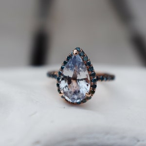 Ice blue sapphire engagement ring. Pear cut blue sapphire ring. 4ct sapphire ring diamond ring 14k rose gold. Engagement ring  Eidelprecious