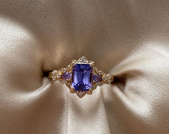 Arwen Tanzanite engagement ring emerald cut. Purple Fantasy ring 14k Gold engagement ring. Tanzanite, sapphires, and diamonds ring.