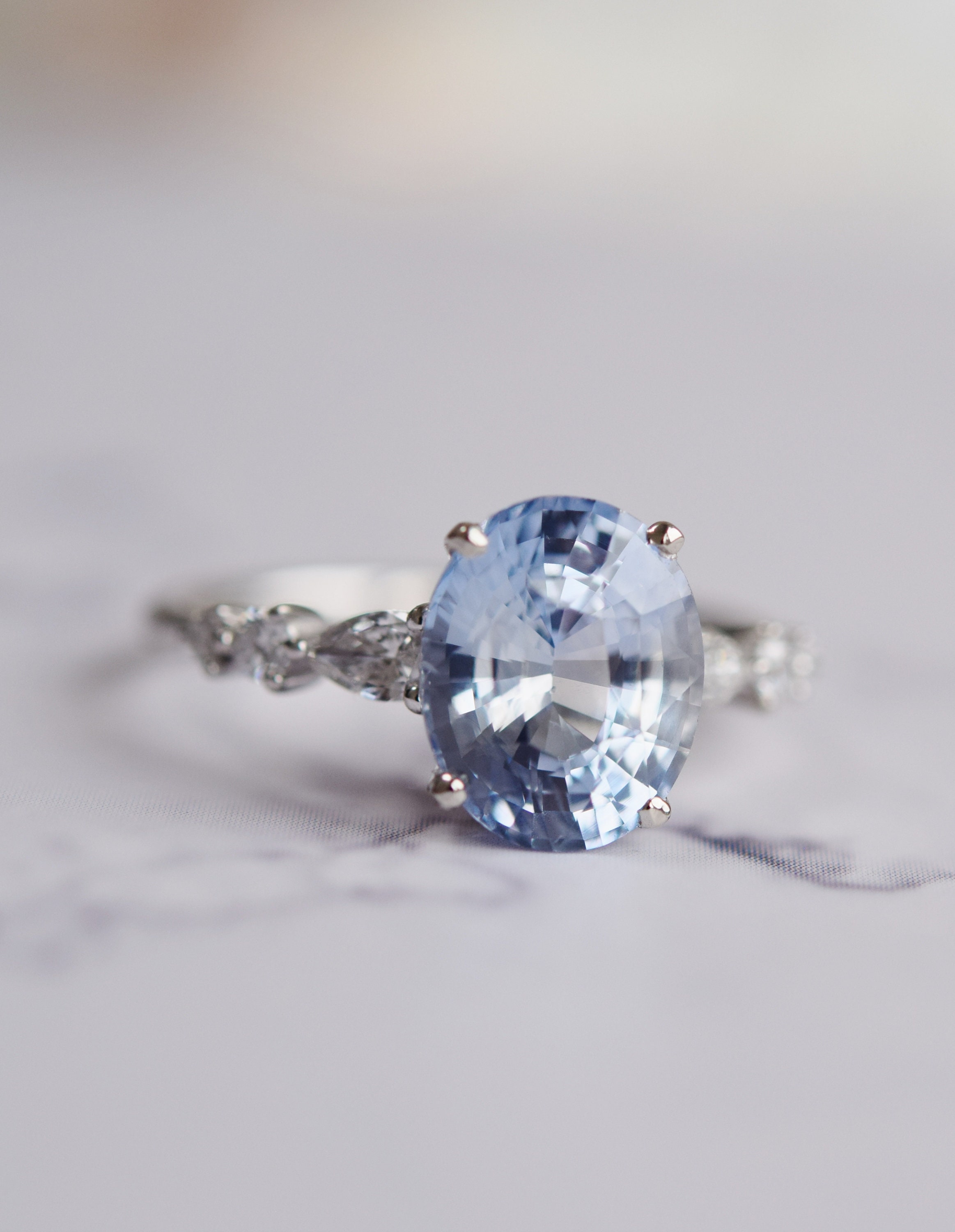 Ice Blue Sapphire Engagement Ring. Oval White Gold Engagement
