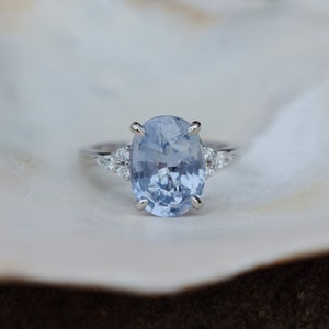 Arctic blue sapphire engagement ring. Color change sapphire ring 4ct oval diamond ring Platinum ring. Campari design by Eidelprecious