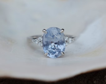 Arctic blue sapphire engagement ring. Color change sapphire ring 4ct oval diamond ring Platinum ring. Campari design by Eidelprecious