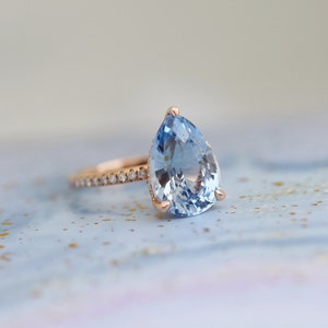 6ct Sky Blue sapphire ring. GIA certified Pear cut Ceylon Blue Sapphire Ring. 14k Rose Gold Diamond ring. Right hand Ring by Eidelprecious.