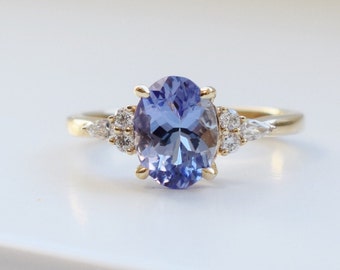 Periwinkle Tanzanite ring in 14k Yellow Gold. Cluster Engagement ring and bridal set. Lavender Ring by Eidelprecious.