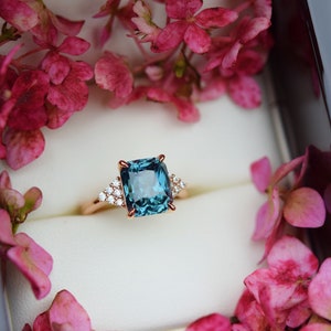 Teal lagoon sapphire engagement ring. 4.5ct radiant cut blue green sapphire ring diamond ring  Martini by Eidelprecious.
