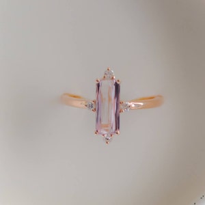 Baguette engagement ring. 1.15ct rectangular emerald cut Peach sapphire 14k rose gold diamond ring. Engagement ring by Eidelprecious.