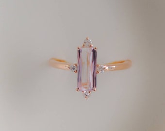 Baguette engagement ring. 1.15ct rectangular emerald cut Peach sapphire 14k rose gold diamond ring. Engagement ring by Eidelprecious.