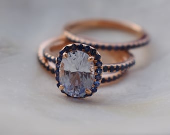 Ice blue sapphire bridal set. Rain blue sapphire engagement ring and matching bands. Unique Rose gold engagement ring set by Eidelprecious.