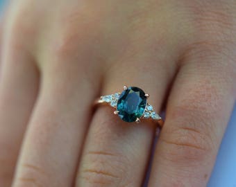 Teal sapphire engagement ring. Peacock green sapphire 3.1ct oval diamond ring 14k Rose gold. Campari Engagement ring by  Eidelprecious.