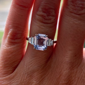 Ice Blue Sapphire Engagement Ring. Emerald cut sapphire ring. Platinum engagement ring blue sapphire. Minimalist modern ring