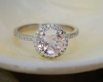 Peach sapphire engagement ring. White gold engagement ring. Diamond halo ring. 1.95ct round peach sapphire ring by Eidelprecious.