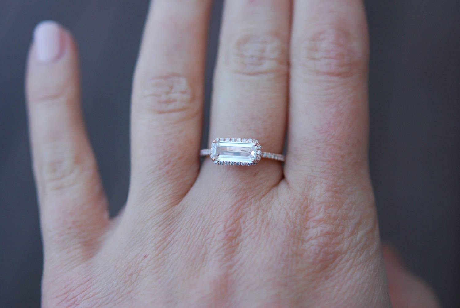 Baguette engagement ring. 1.9ct rectangular emerald cut white
