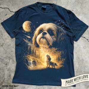 May include: True navy blue t-shirt featuring a detailed illustration of a Shih Tzu dog under a full moon and starry night sky. The design includes a waterfall and forest scene. The text "MADE WITH LOVE BY ANIMAL PARC APPAREL" is printed on the bottom right.
