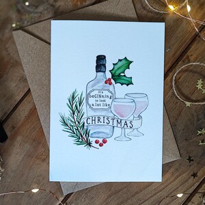 de Noël d'une bouteille de gin | Aquarelle et impression encre | Carte texturée de haute qualité | Carte de Noël de jeu de mots | style vintage