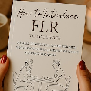 May include: A book titled "How to Introduce FLR to Your Wife" is held by a person. The cover features text and an illustration of a couple at a table. A candle and a mug are in the background.