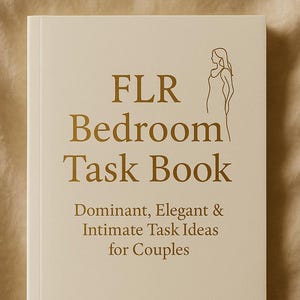 Könnte beinhalten: Ein cremefarbenes Buch mit dem Titel "FLR Bedroom Task Book" mit goldfarbenen Buchstaben und einer Strichzeichnung einer Frau. Der Untertitel des Buches lautet "Dominant, Elegant & Intimate Task Ideas for Couples."