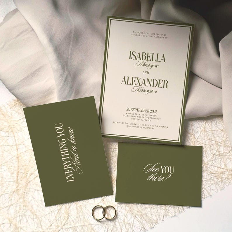 May include: A wedding invitation suite featuring a cream-colored main card with dark green borders and text, alongside two olive green cards with white lettering reading "EVERYTHING YOU Need to know" and "See YOU there?" with two gold rings.