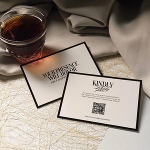 May include: Two white invitation cards with black borders and text, one reading "YOUR PRESENCE WILL HONOR" and the other "KINDLY Reply". A glass of tea sits nearby. The cards include a QR code and website address.