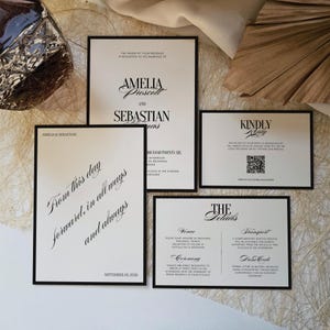 May include: A collection of wedding invitation cards with black borders. The cards feature elegant calligraphy with the names "Amelia Prescott" and "Sebastian" and the text "From this day forward, in all ways and always."