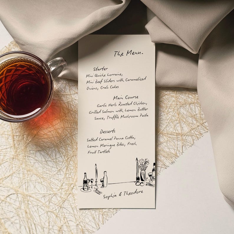 May include: A menu card with the title "The Menu" and a list of dishes, including starters, main courses, and desserts. The card is cream-colored with black text and illustrations. A glass of tea sits to the left.