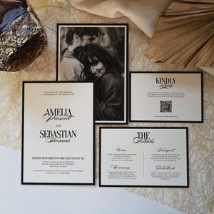 May include: A collection of wedding stationery with black borders. The set includes an invitation with the names Amelia Prescott and Sebastian Thomas, a black and white photo, and cards with details and RSVP information. The text is in black.