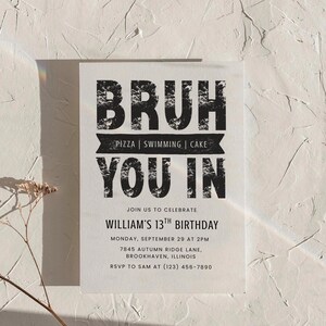 May include: A white invitation card with black text. The text reads "BRUH YOU IN" with "PIZZA | SWIMMING | CAKE" in a banner. Below, it says "WILLIAM'S 13TH BIRTHDAY" with the date, time, address, and RSVP information.