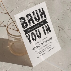 May include: A white invitation card with black text that reads "BRUH YOU IN". The card also includes details for William's 13th birthday, including the date, time, and location. The invitation is decorated with a distressed font.