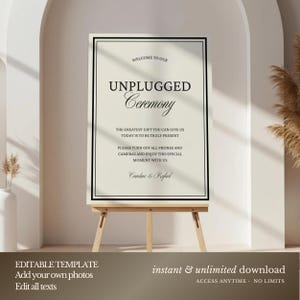 May include: A cream-colored sign with black text on a wooden easel. The sign reads "Welcome to our Unplugged Ceremony" and includes a message about turning off phones and cameras. The bottom of the sign says "Caroline & Rafael".
