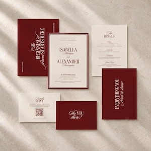 May include: A wedding invitation suite featuring deep burgundy and cream-colored cards. The set includes a main invitation, a details card, a reply card with a QR code, and two smaller cards with the text The Beginning Starts Here and See You There.